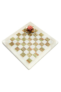 Onyx checkmate with porcelain and brass rose