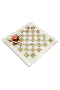 Onyx checkmate with porcelain and brass rose