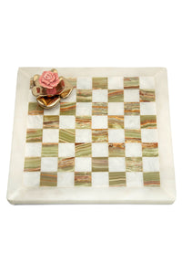 Onyx checkmate with porcelain and brass rose