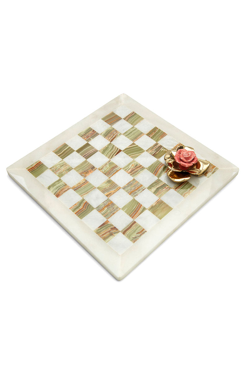 Onyx checkmate with porcelain and brass rose