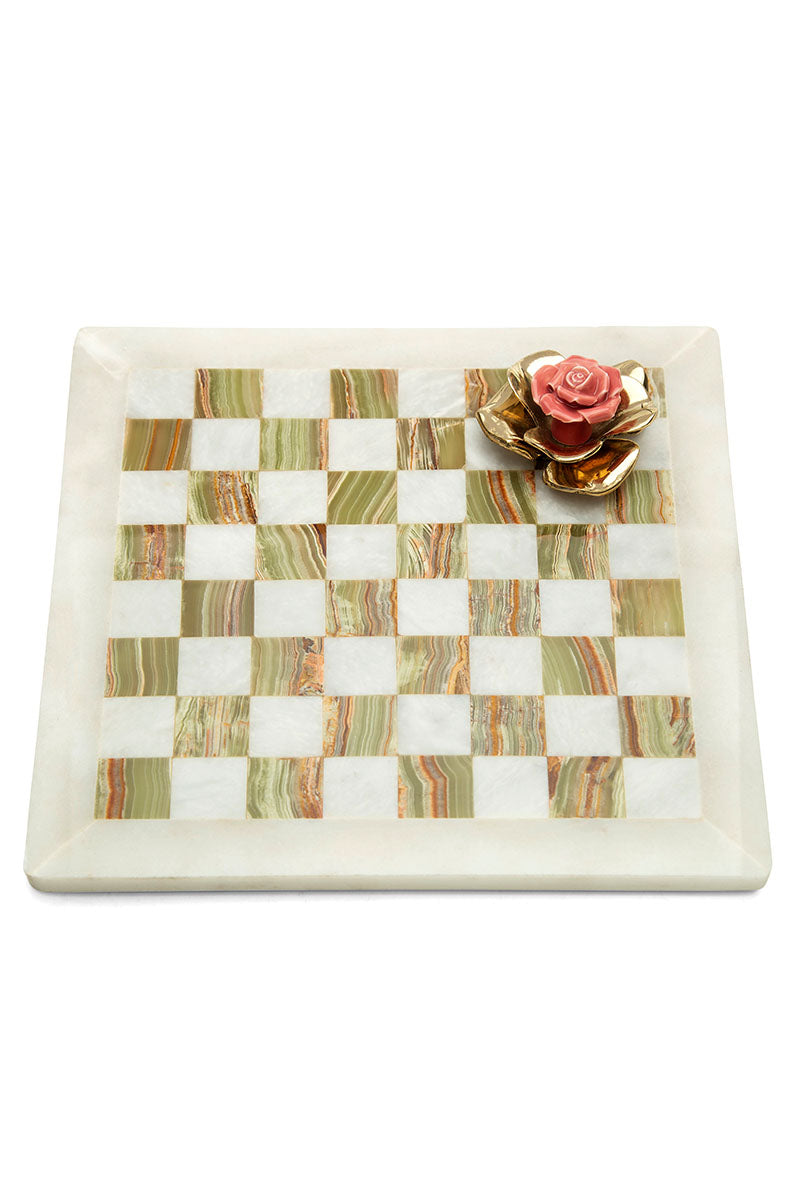 Onyx checkmate with porcelain and brass rose