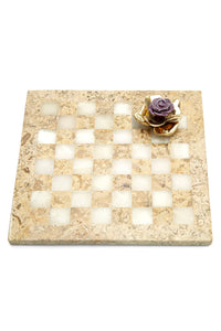 Checkmate with porcelain and brass rose